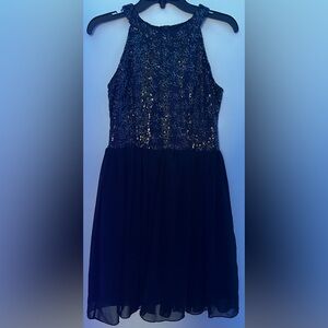 Im selling a black sparkly dress by altard state that’s a size small.